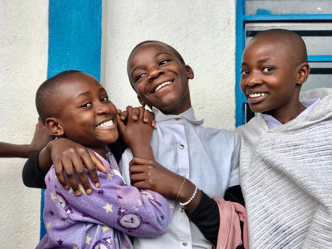Three students from the Jonathan Holiday School